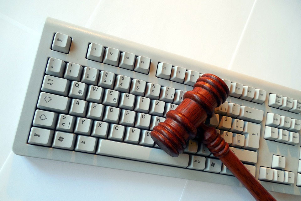3-Ideas-You-Need-to-Understand-About-Online-Gaming-Laws-hammer-and-keyboard